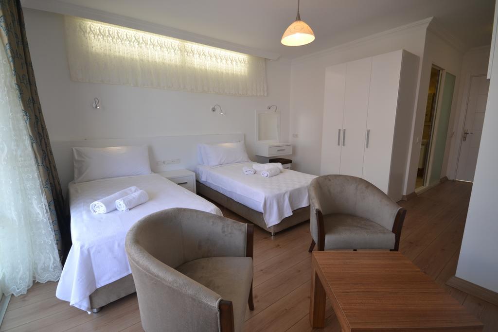 Kelebek Studio Apartments Kalkan Habitación foto