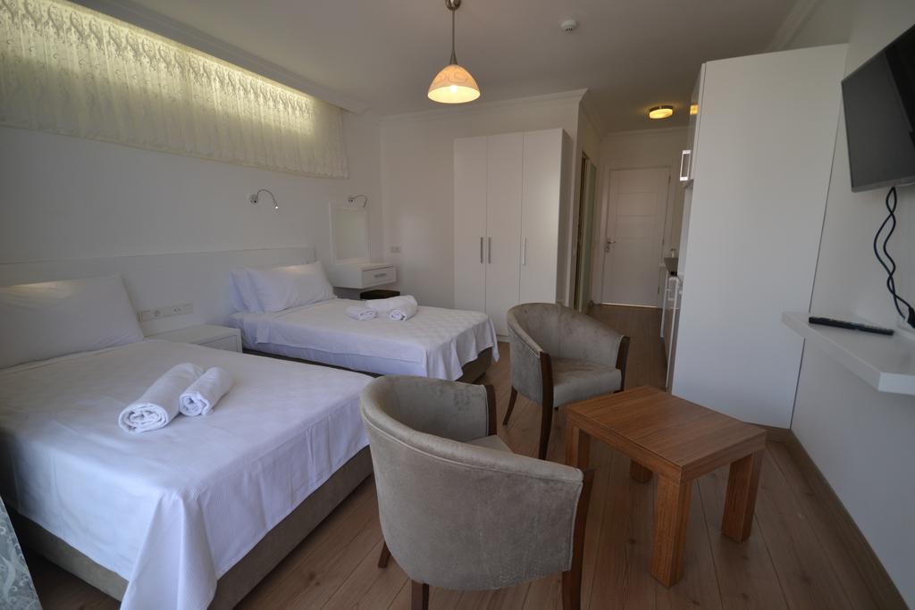 Kelebek Studio Apartments Kalkan Habitación foto